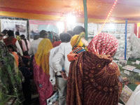 Ganga Exhibition - Piligrims watching models
